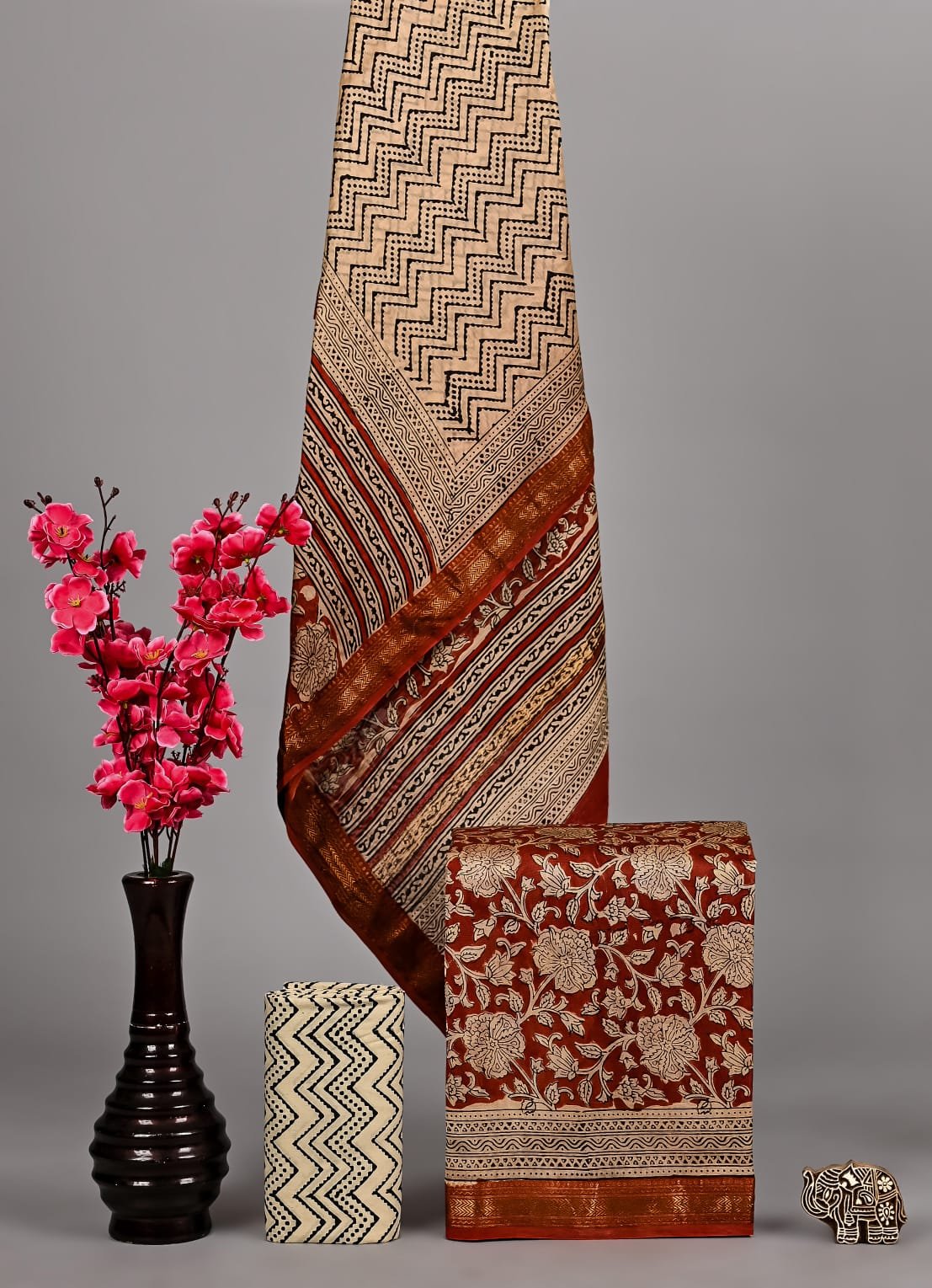 Beige and rust Maheshwari silk dress material with zigzag and floral hand block print design