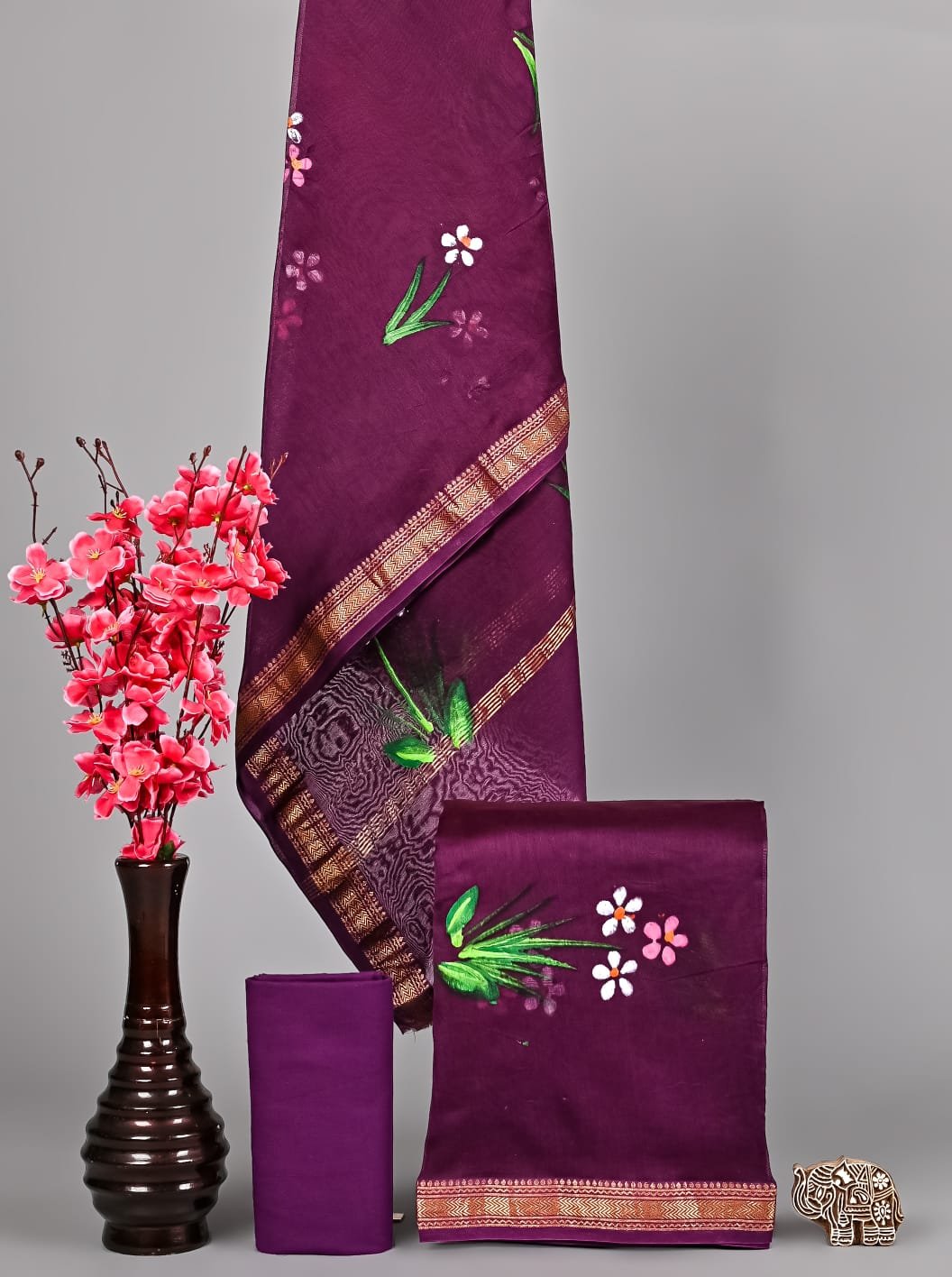 Purple Maheshwari silk suit dress material with floral motifs and golden zari border