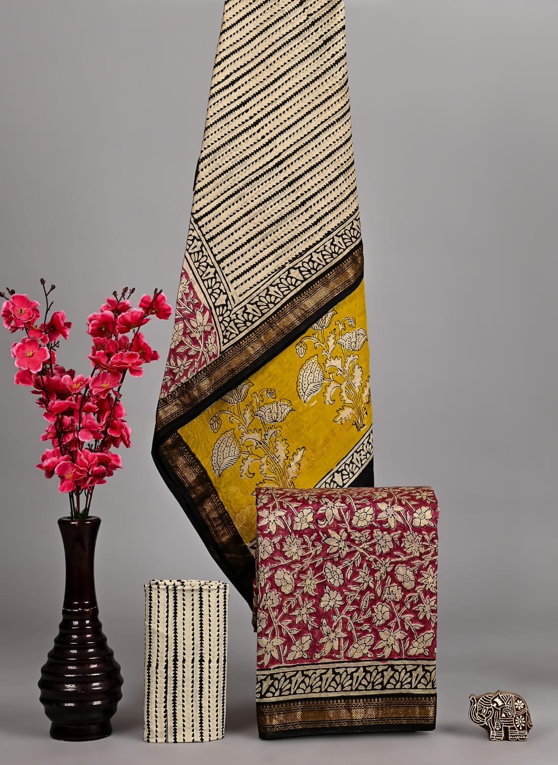 Cream and mustard Maheshwari silk suit with zigzag and floral block print, zari border, and maroon floral dupatta piece