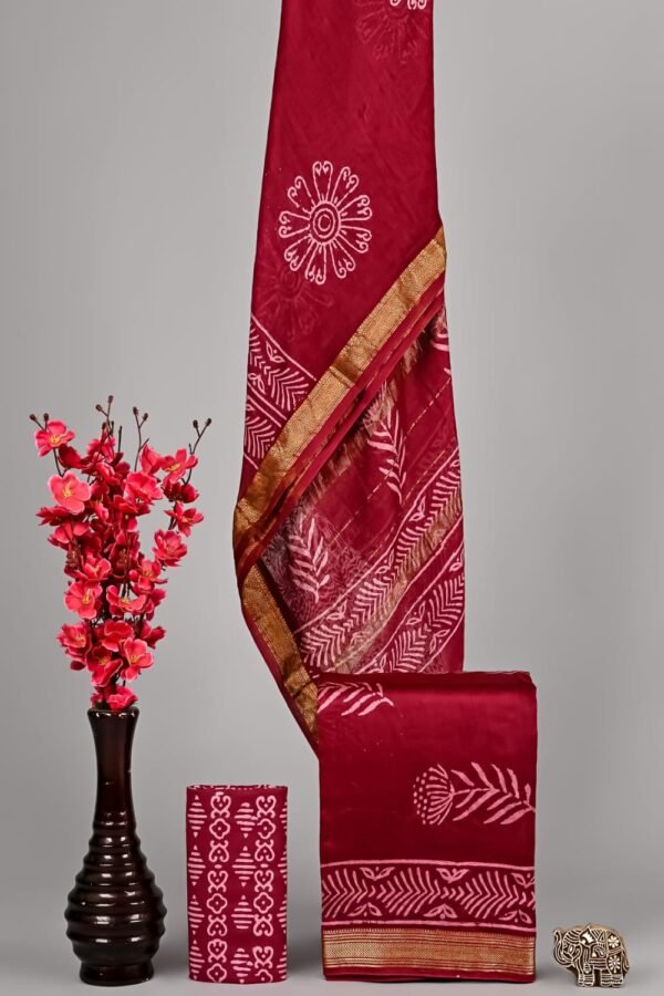 Maroon Maheshwari silk suit with fern-leaf block print and golden zari border