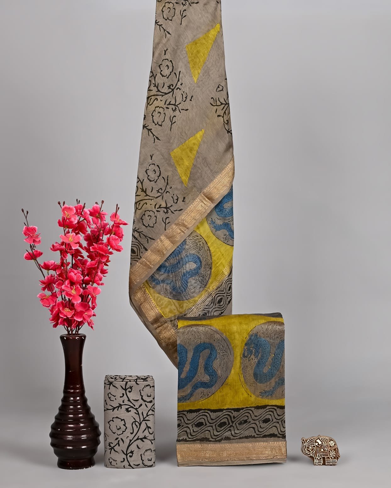 Grey Maheshwari silk suit with floral vine print and mustard dragon medallion block print, zari border