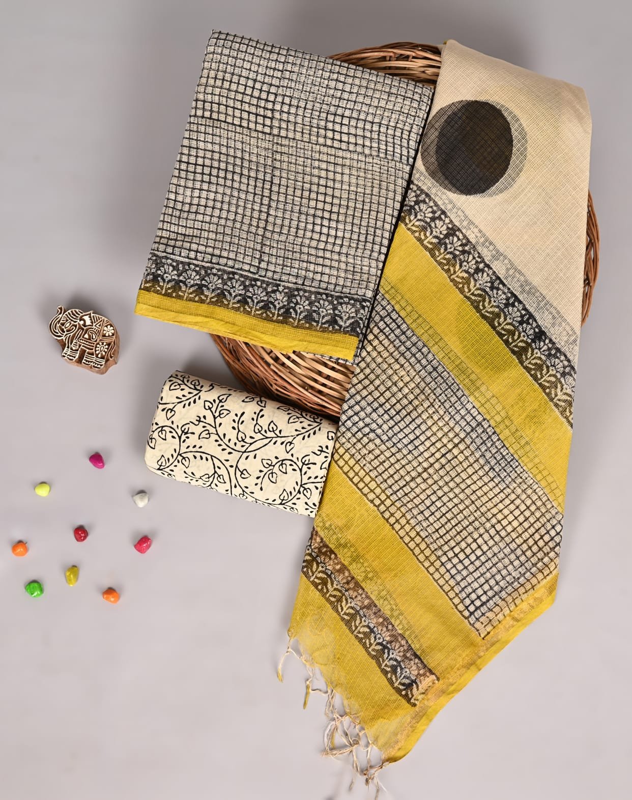 Grey checkered Kota Doria suit fabric with black floral border and cream dupatta with circle motif