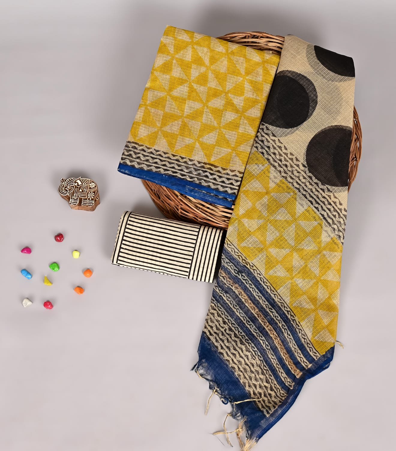 Mustard yellow geometric print Kota Doria suit fabric with black circle motif dupatta