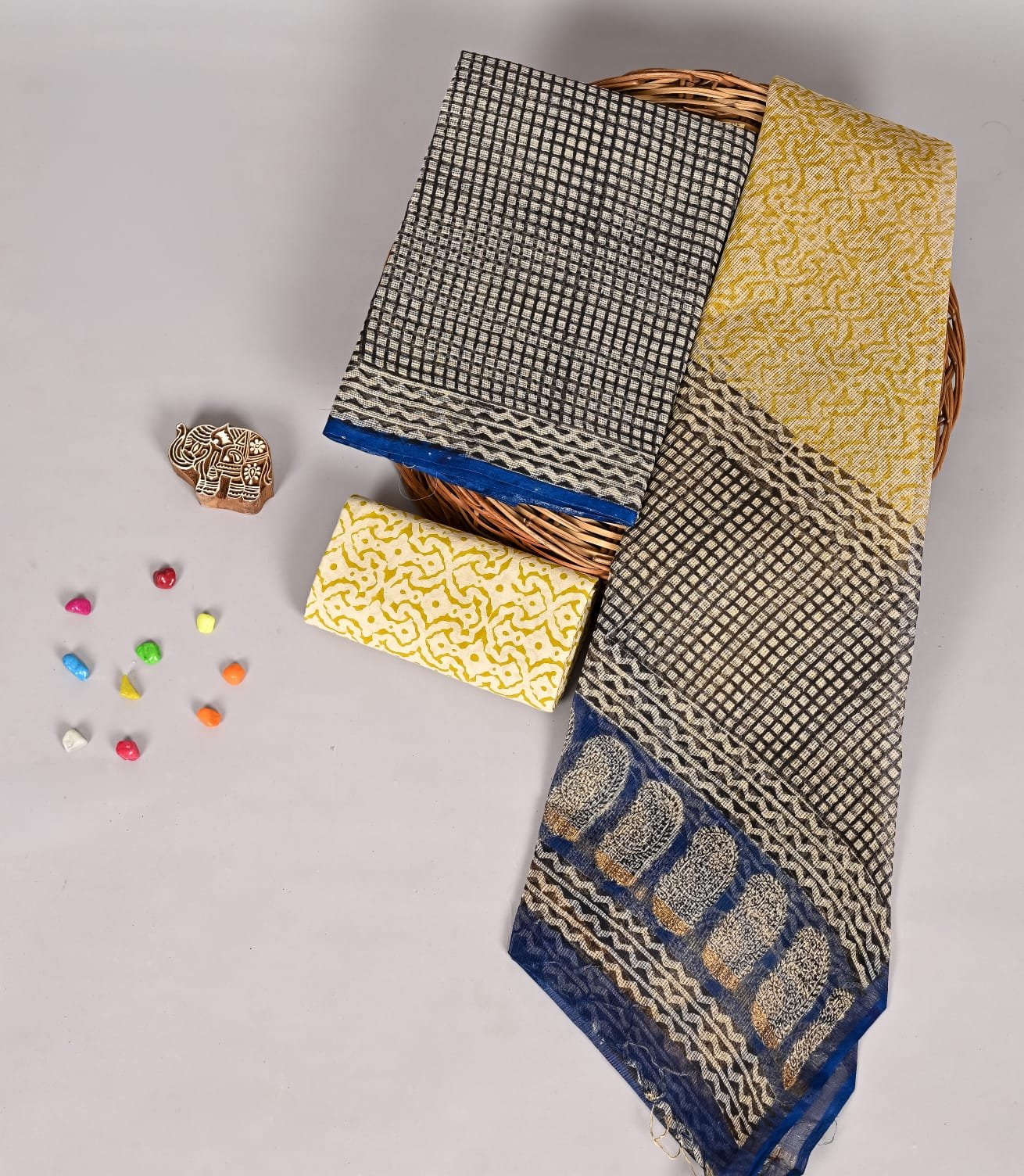 Grey checked Kota Doria suit set with navy fingerprint border and mustard zigzag dupatta piece