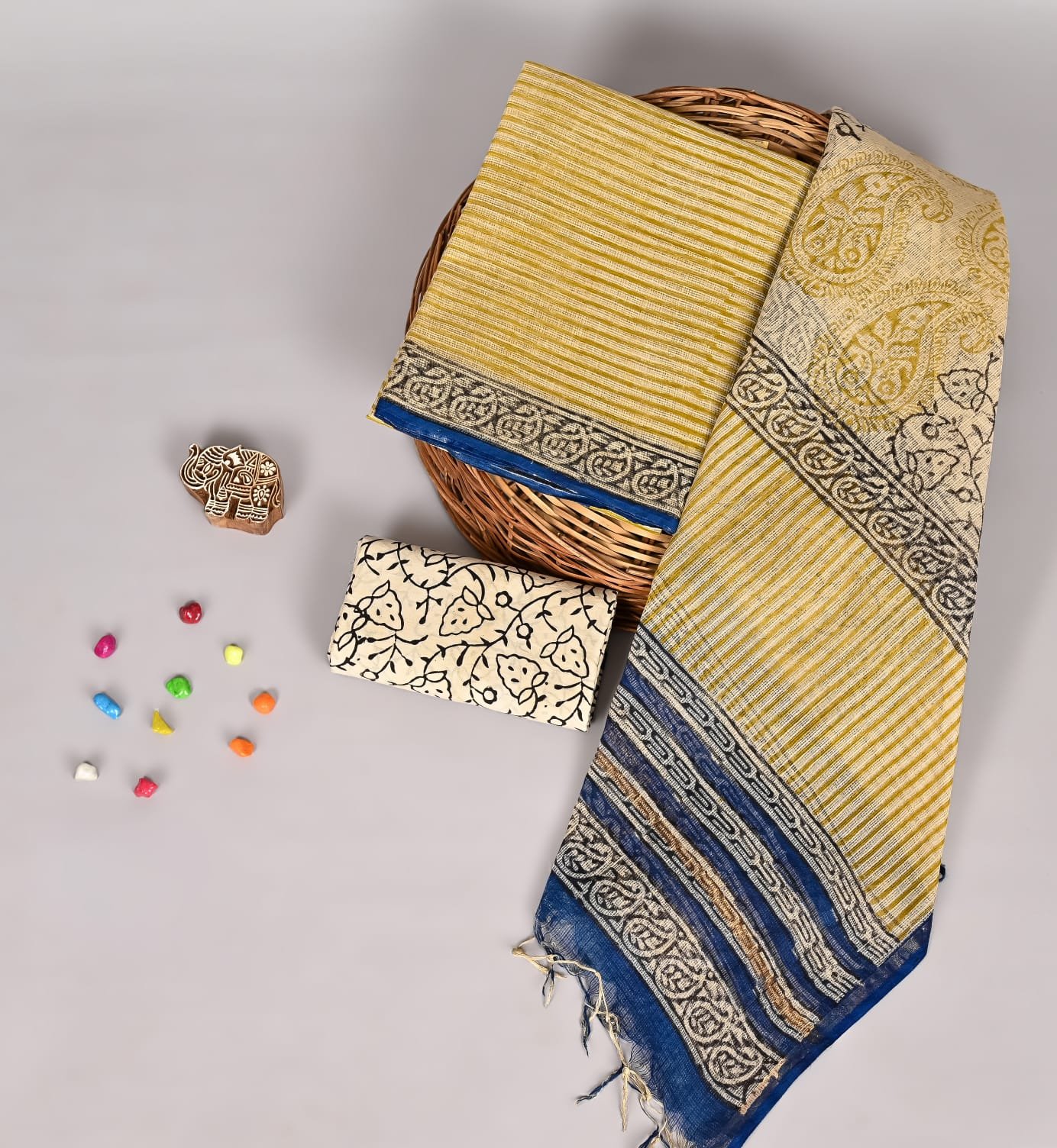 Mustard yellow striped Kota Doria suit set with paisley print dupatta and navy floral border