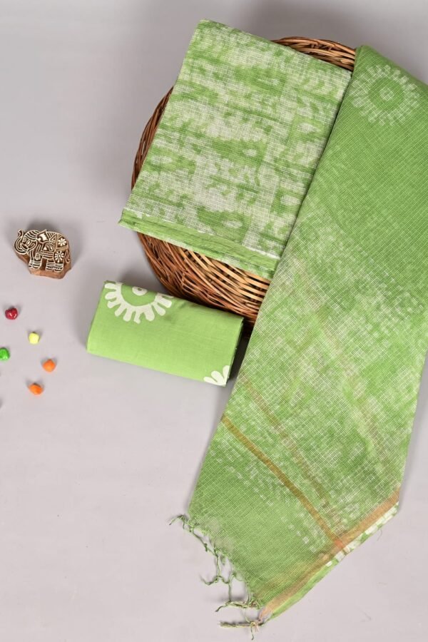 Green Kota Doria suit set with mottled print and sunburst motif dupatta