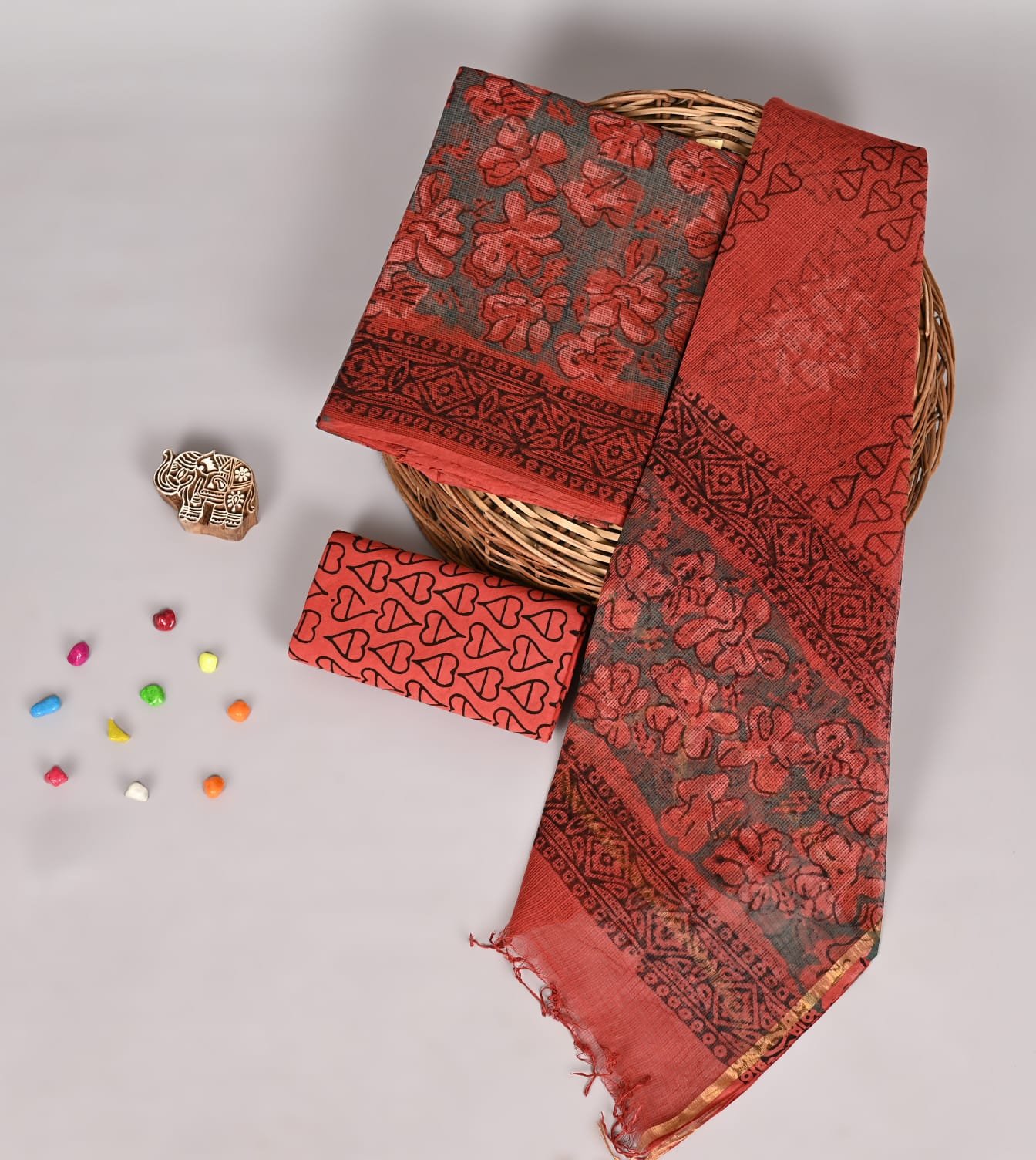 Rust red and grey Kota Doria suit set with floral block print and heart-motif piece