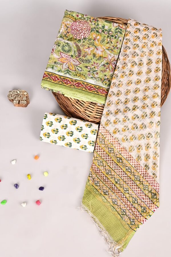 Green Kota Doria suit with floral print, cream bootah piece, and striped border dupatta