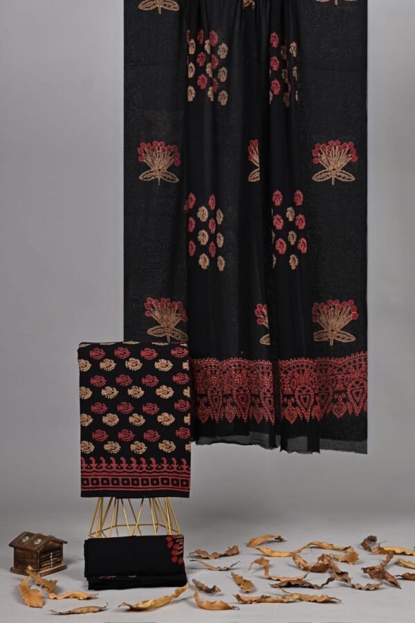 Black hand block printed cotton suit with mustard floral motifs and red paisley border, cotton dupatta
