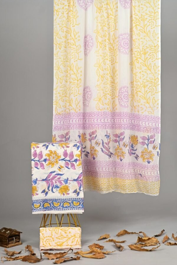 Cream cotton suit with mustard floral print and lilac border, with matching cotton dupatta
