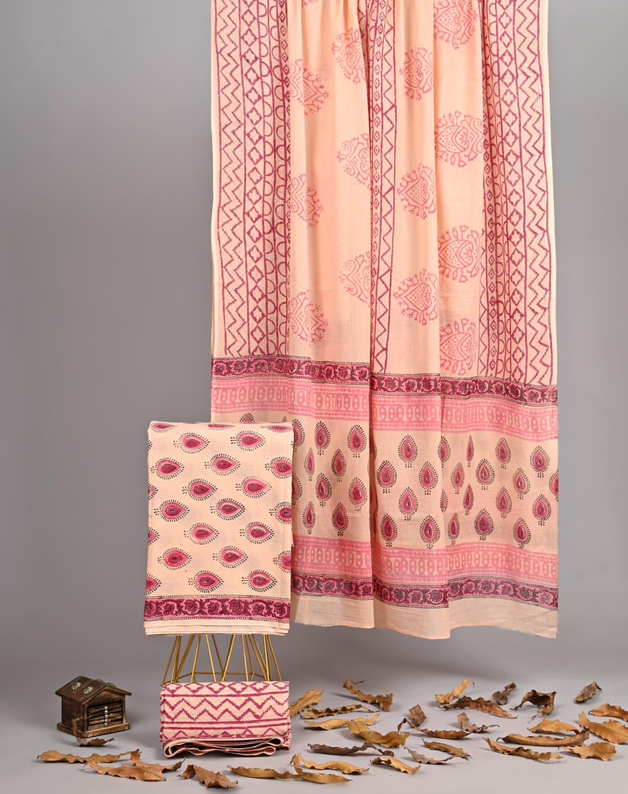 Peach hand block printed cotton suit and dupatta with maroon paisley motif and zigzag border