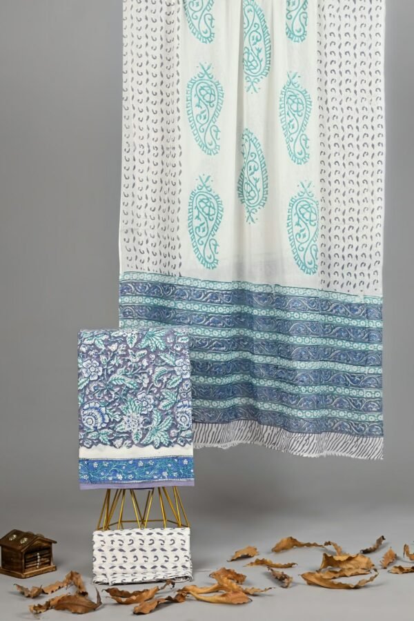 White cotton suit set with teal paisley print dupatta and floral bordered fabric