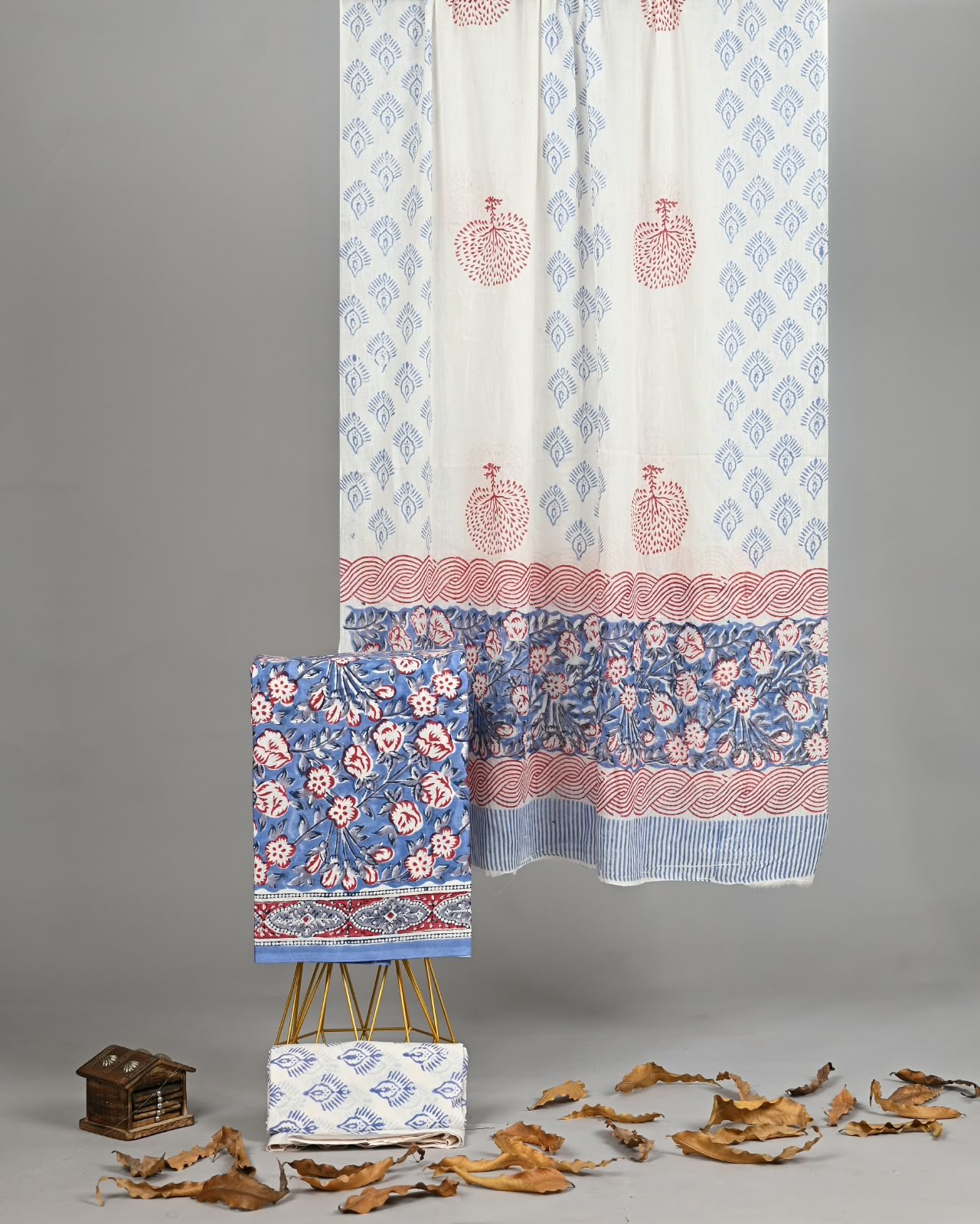 White hand block printed cotton suit with blue paisley booti and cotton dupatta with red floral border